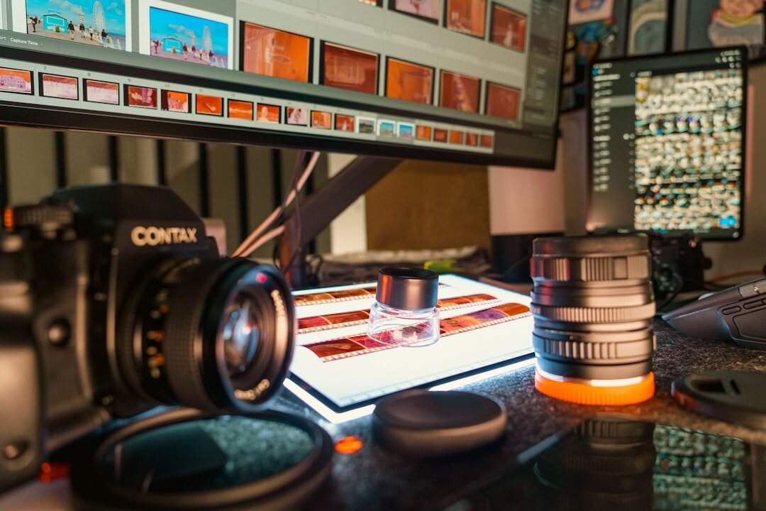 Video editing suite with multiple monitors showing interview footage